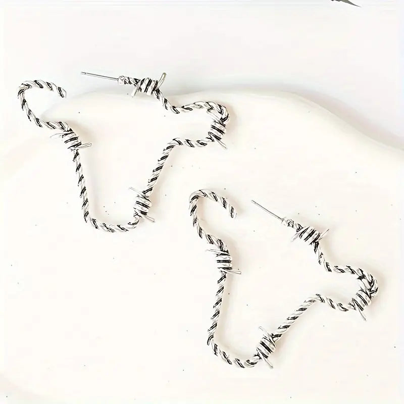 Silver Barbed Cow Earrings