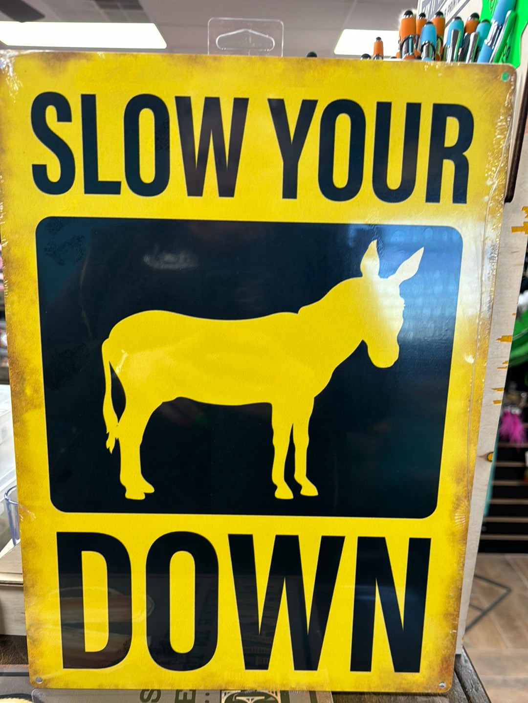 Slow Down Metal Sign